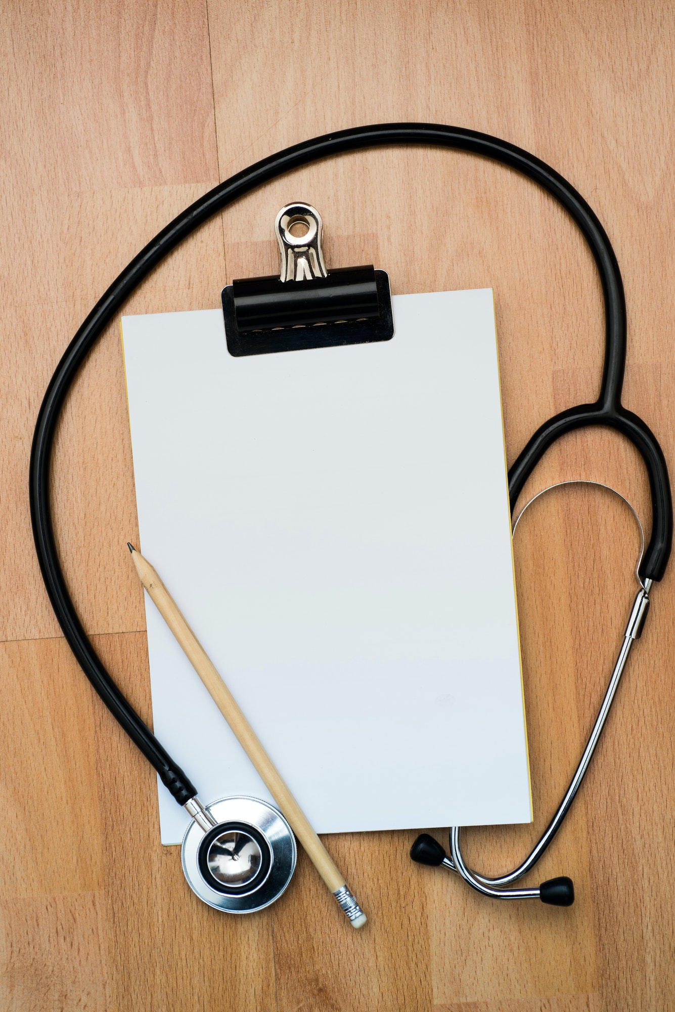 Clipboard with stethoscope