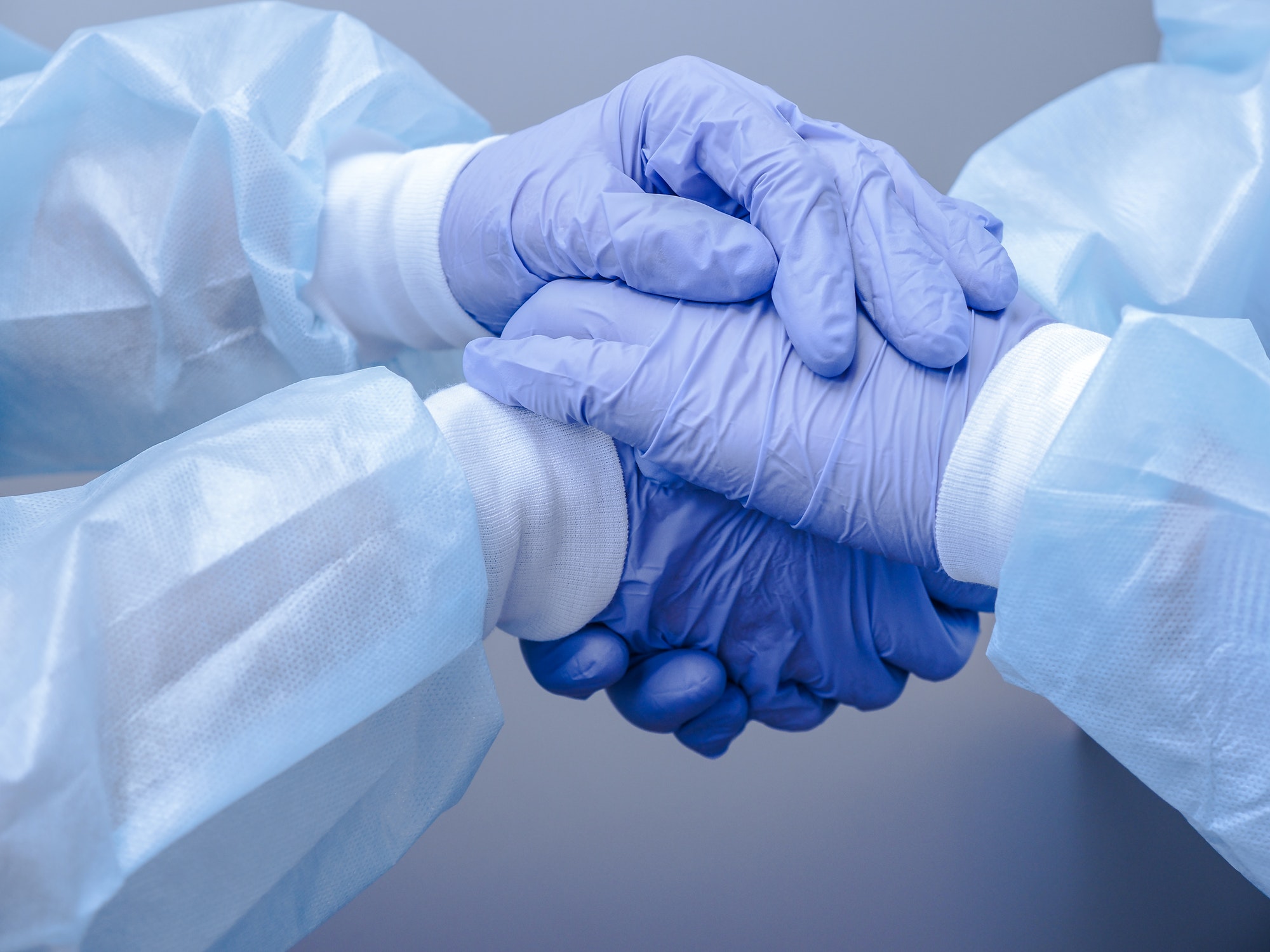 Doctors shake hands